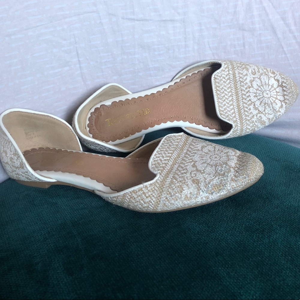 Restricted white “lace” flat